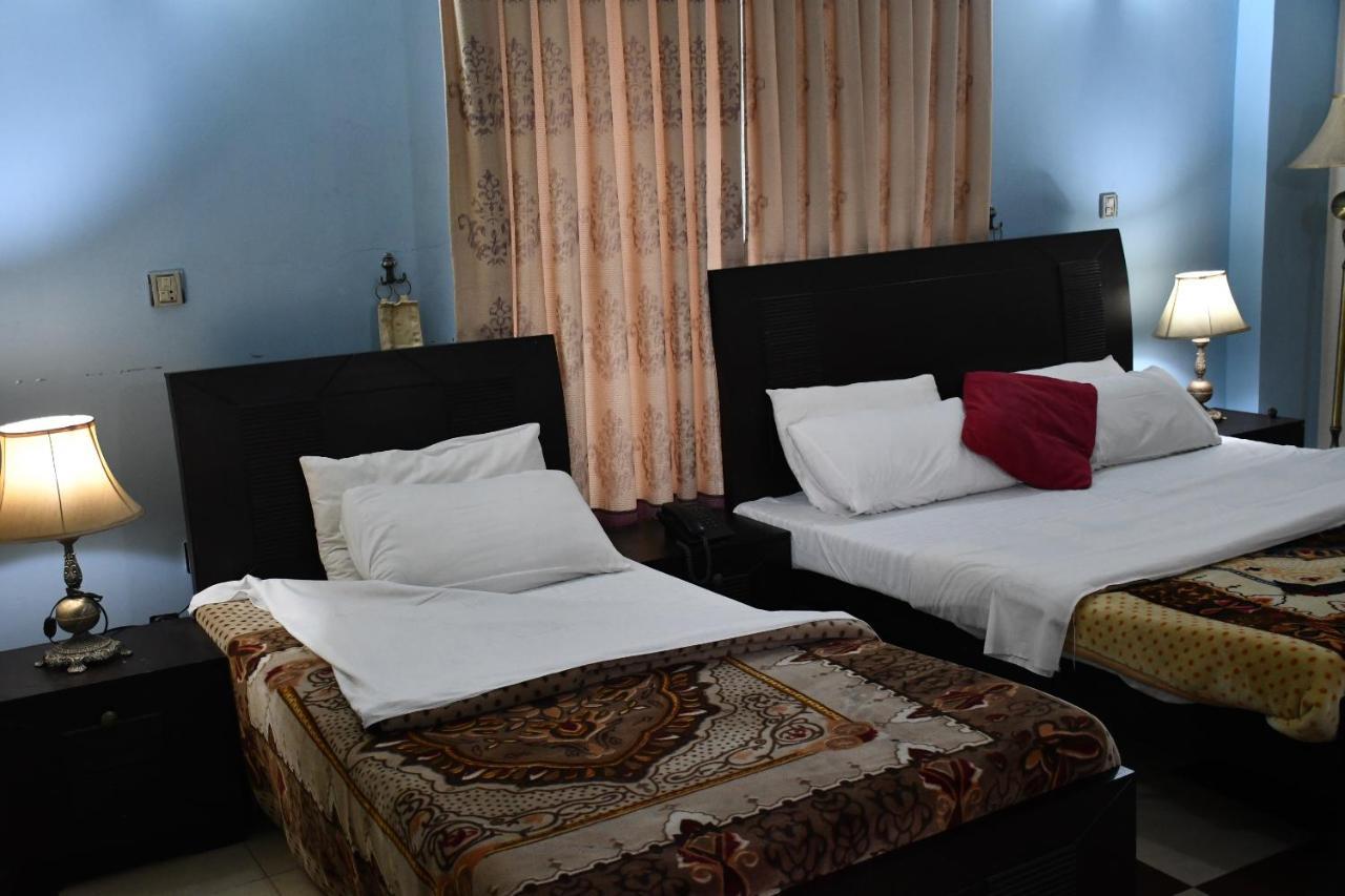 Mir Continental Hotel Muzaffarabad Bagian luar foto