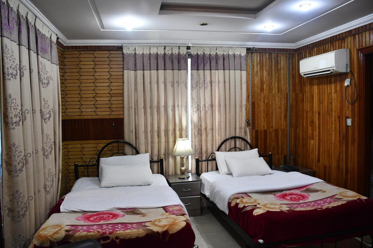 Mir Continental Hotel Muzaffarabad Bagian luar foto