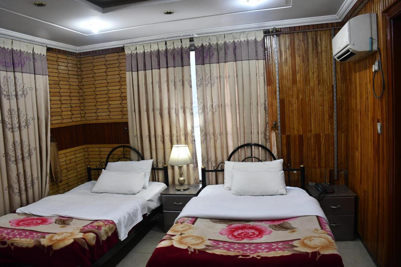 Mir Continental Hotel Muzaffarabad Bagian luar foto